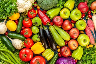 A vibrant display of fresh fruits and vegetables, promoting health and wellness through nutritious eating choices.