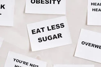 A reminder to reduce sugar consumption for better health, as high intake can lead to diabetes and other health issues.