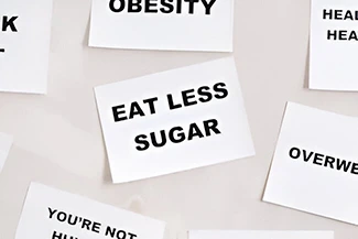 A reminder to reduce sugar consumption for better health, as high intake can lead to diabetes and other health issues.