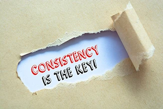A visual representation of the phrase 'consistency is the key,' underscoring the value of daily efforts in personal development.