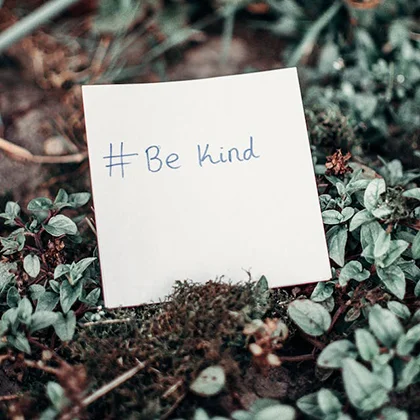 A calming image featuring the message 'Be kind,' that embodies the essence of self-kindness.