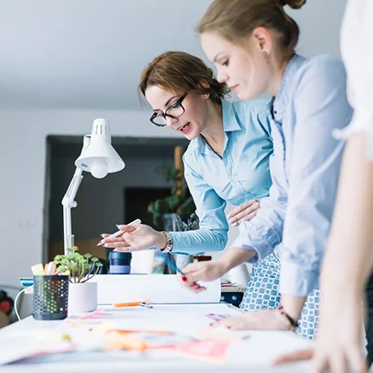 A woman in a blue shirt symbolizes the increasing number of women starting their own businesses and embracing entrepreneurship.